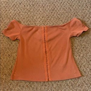 Express crop top with hooks to close the front